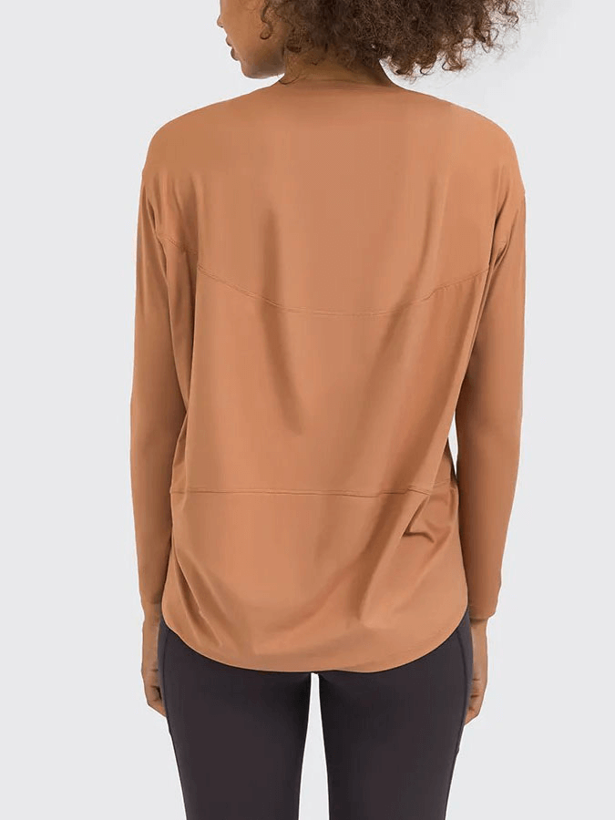 Back view of solid color long sleeves loose gym top SF1821 in brown, worn by a model. Ideal for workouts, made of nylon and spandex.