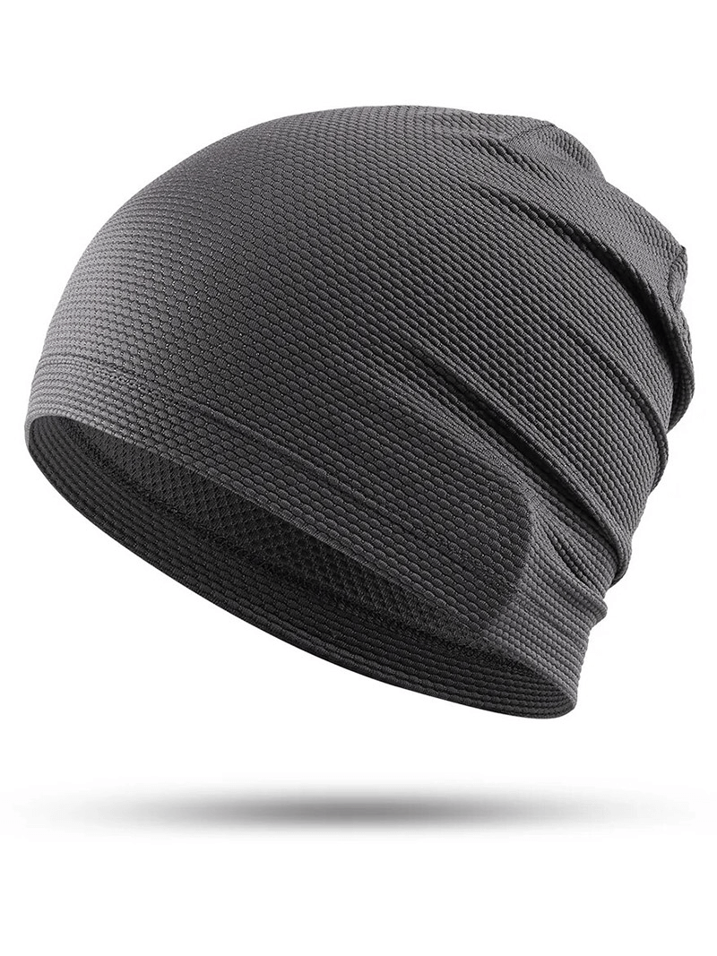 Black breathable unisex beanie for outdoor sports, made from lightweight polyester. Perfect for any casual or active outing.