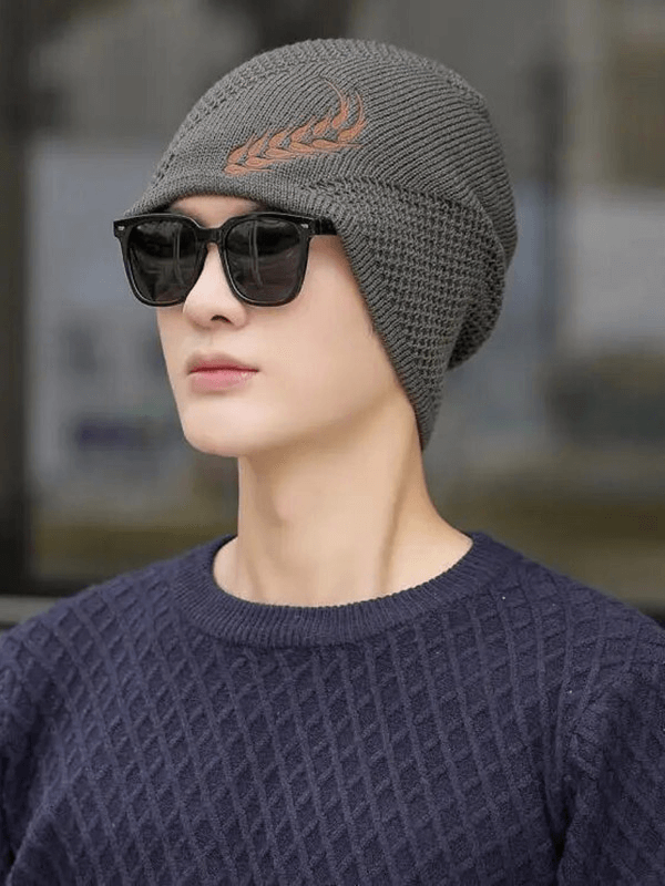 Unisex fashion warm knitted ski beanie with wheat ear pattern, perfect for outdoor use, shown on a model wearing sunglasses.