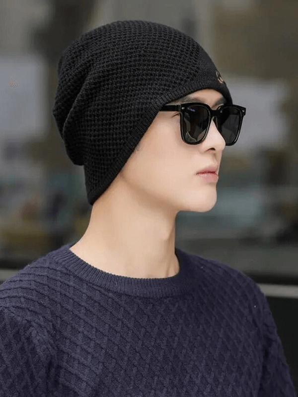 Unisex black knitted ski beanie with wheat ear pattern, perfect for outdoor activities, made from sturdy polyester. SKU: SF1676