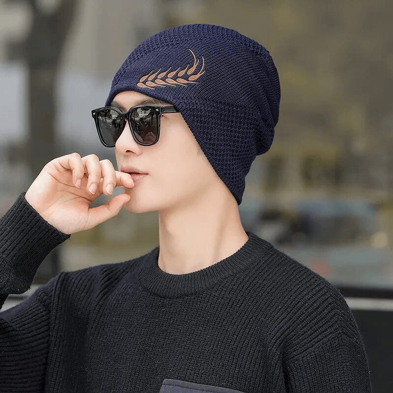 Unisex fashion knitted ski beanie with wheat ear pattern, perfect for outdoor activities, shown on person wearing sunglasses.