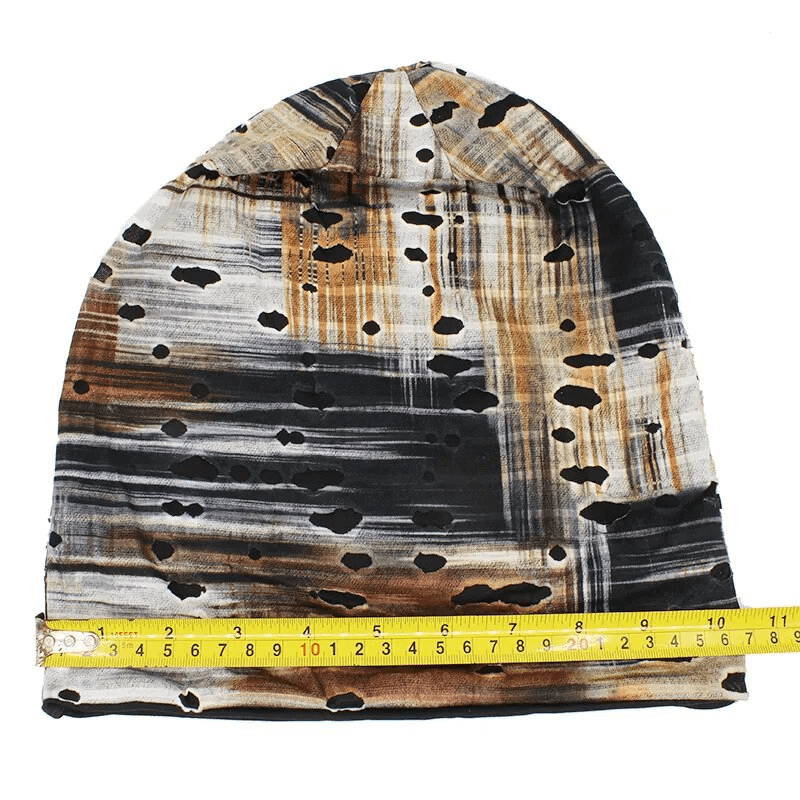Unisex fashion warm thin baggy beanie with holes in geometric pattern, made of polyester. Perfect for casual style and cold weather warmth.
