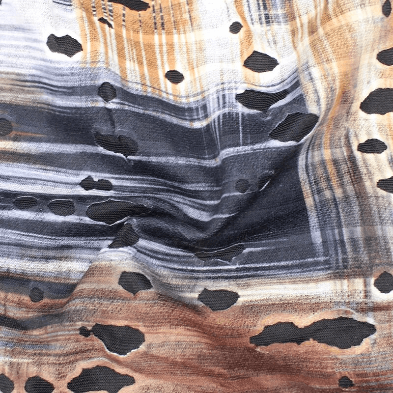 Fashion warm thin baggy beanie with holes, featuring a geometric pattern in brown and blue hues. Ideal for casual winter wear.