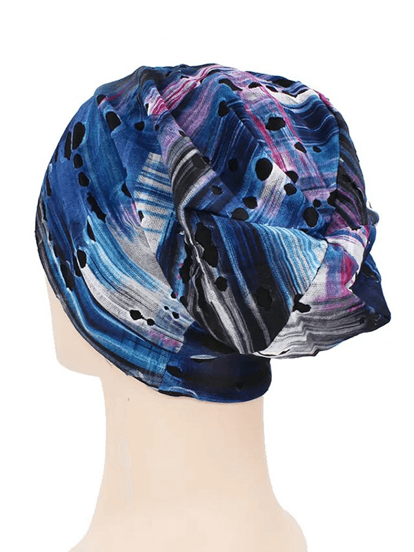 Unisex fashion warm thin baggy beanie with geometric pattern and holes, perfect for a casual, stylish look in cold conditions.