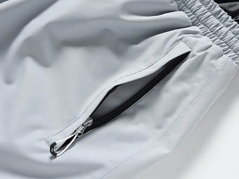 Close-up of the zipper detail on warm windproof waterproof snowboarding pants SF1842, showcasing durable polyester fabric.