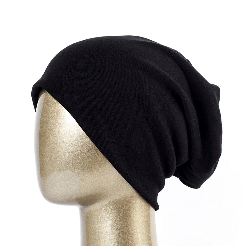 Fashionable black cotton casual women's beanie SF1699 displayed on mannequin head, perfect stylish accessory for any casual outfit.