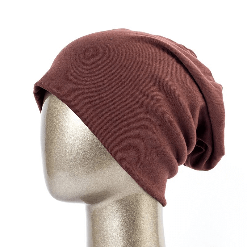 Casual women's beanie in solid color cotton, perfect for stylish warmth and multifunctional use. Model SF1699.