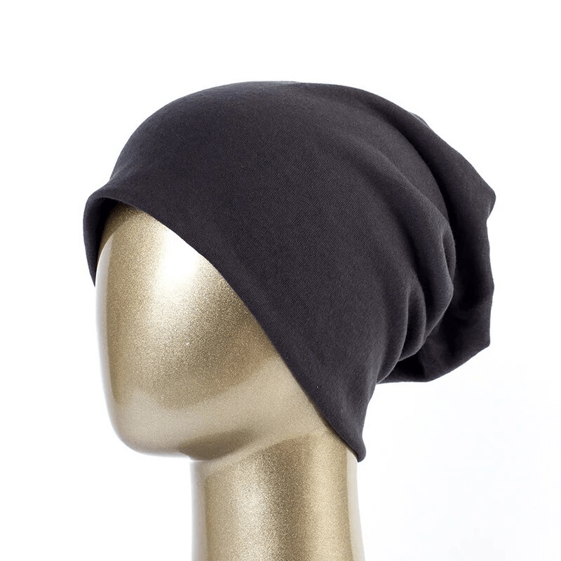 Fashionable cotton casual women's beanie in solid black, ideal for stylish and warm look - SF1699.