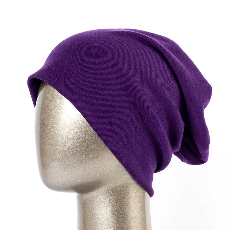 Purple cotton women's beanie on mannequin head, casual solid style, perfect for warmth and fashion. SF1699 hat accessory.