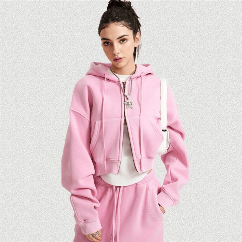 Fashionable pink fleece short women's hoodie with zipper, showcasing a stylish and cozy design for chic casual wear.
