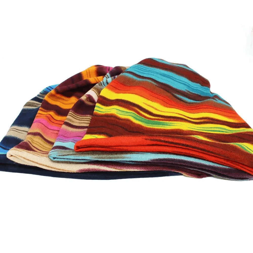 Fashionable multi-colored insulated women's beanies with a striped pattern, perfect for keeping warm in style. Made from lightweight polyester.