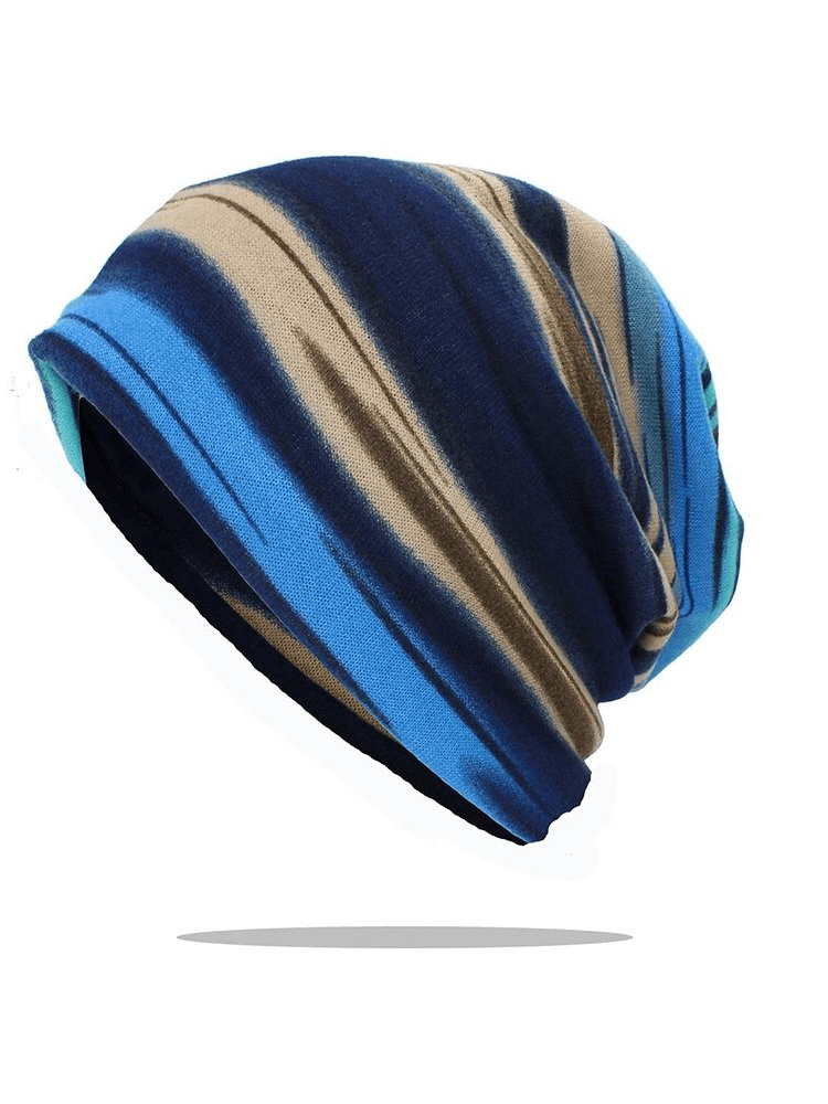 Fashionable multi-colored insulated women's beanie with striped pattern, designed for warmth and style, made of lightweight polyester.