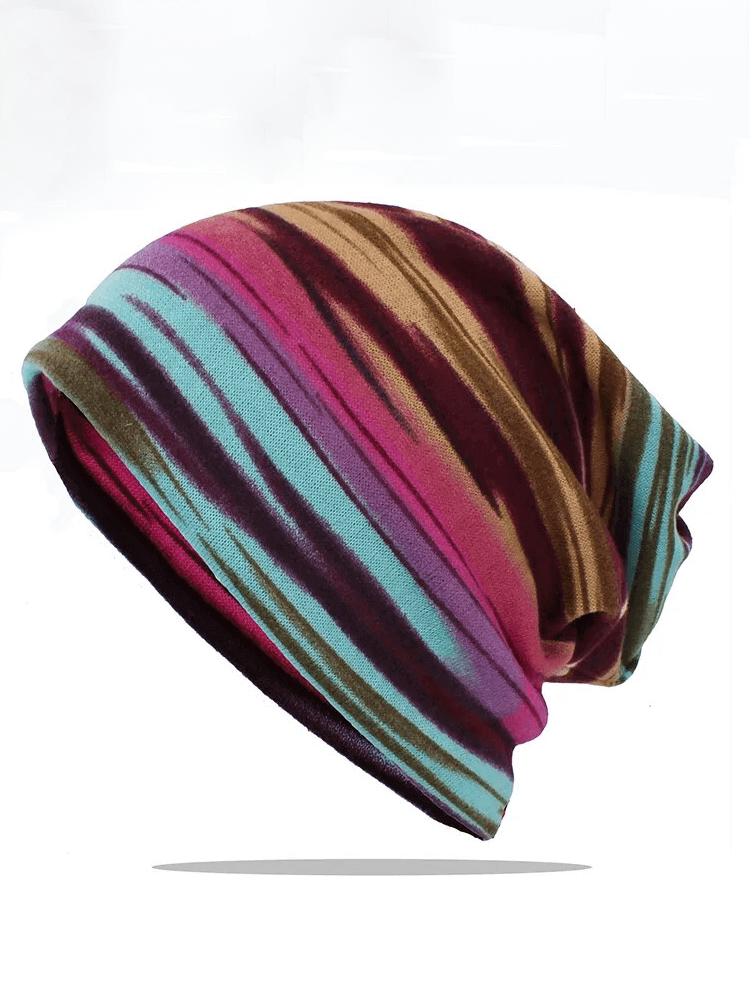 Fashionable multi-colored insulated women's beanie with striped pattern, made from lightweight polyester for warmth and style.