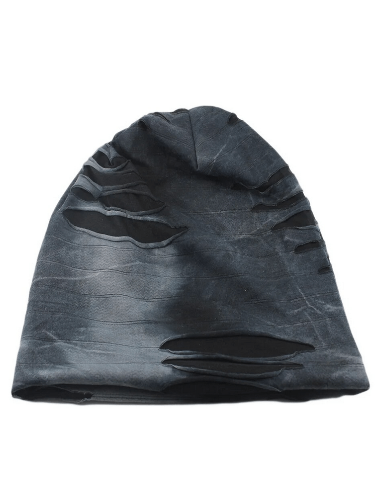 Fashionable men's sports beanie with ripped holes and geometric pattern, made of polyester. Perfect for casual wear and keeping warm.