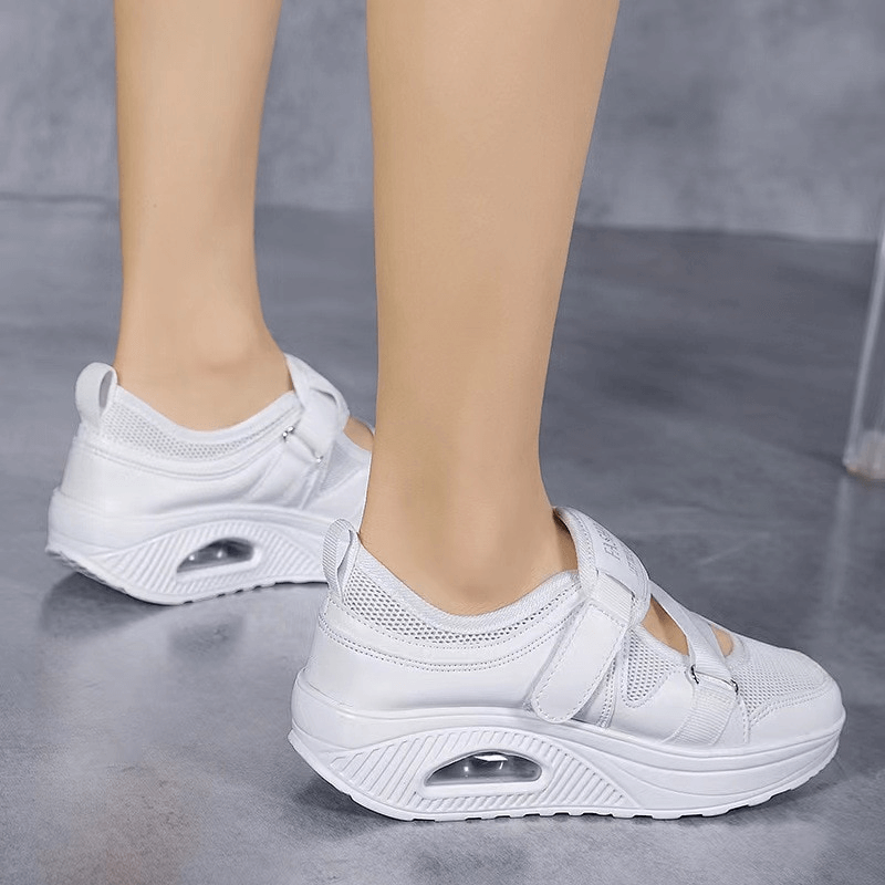 Fashionable women's sneakers with air-mesh upper and platform sole, perfect for sport and style. Comfortable PU insole included. Model SF1540.