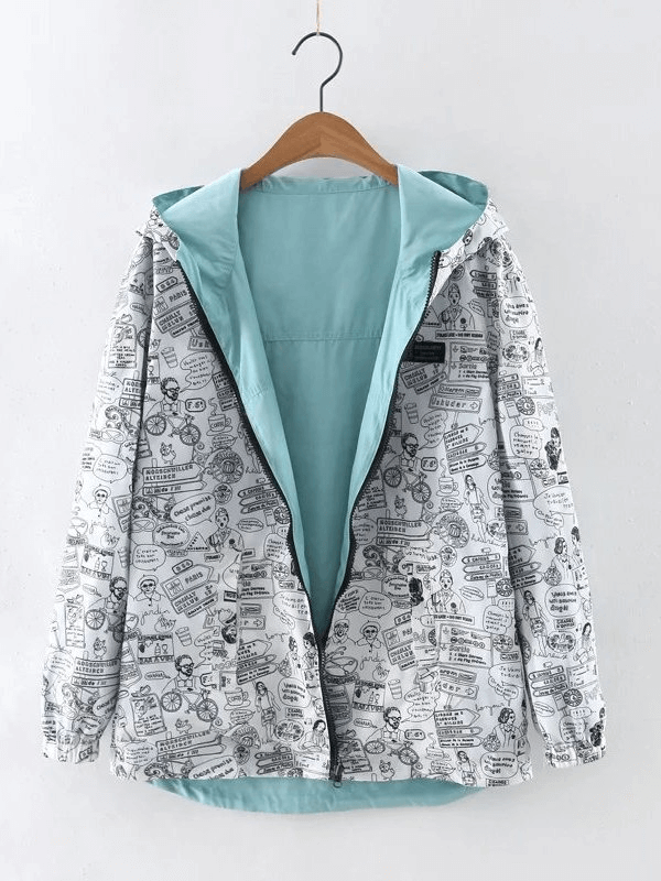 Fashionable two-sided breathable women's windbreaker with hood in playful print, ideal for stylish layering and weather protection.