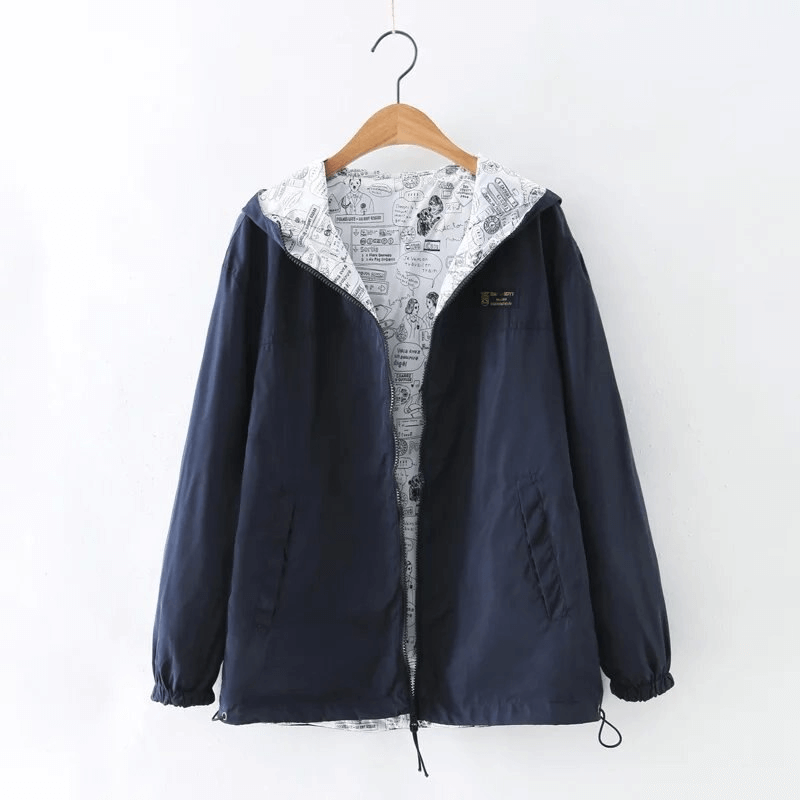 Two-sided breathable women's windbreaker with hood, navy and patterned interior, featuring zipper and pockets for stylish outdoor comfort.