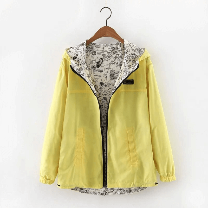 Yellow two-sided breathable women's windbreaker with hood and zipper, showcasing stylish, lightweight design on a hanger.