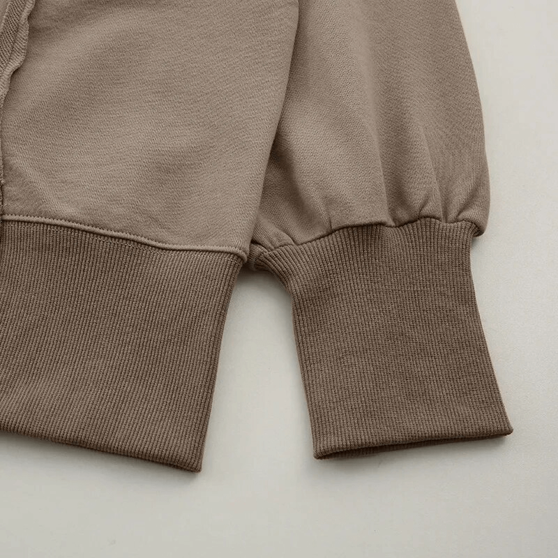 Close-up of the cuff on the fashionable women's oversize sweatshirt SF1575, showing reversible seam and ribbed cotton fabric.