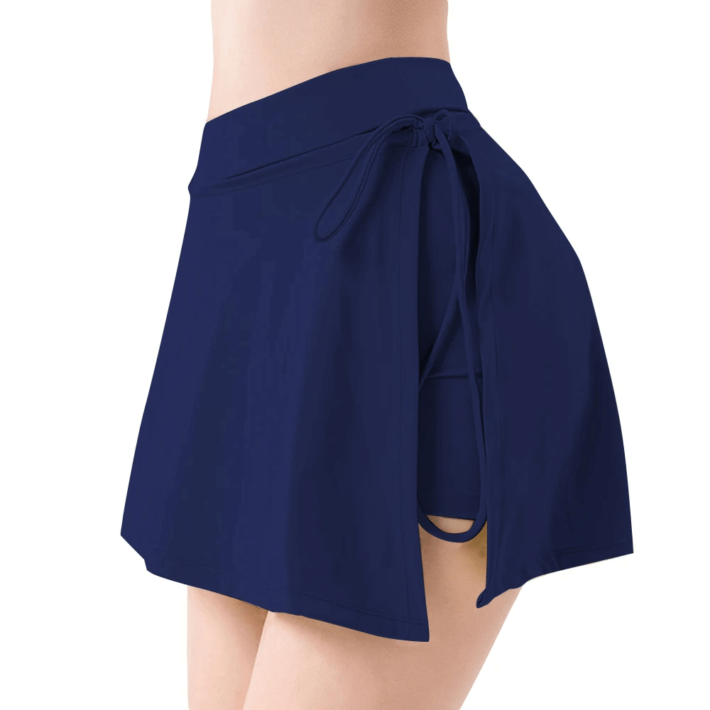 Versatile navy tennis skirt-shorts for women with pocket, ideal for badminton, golf, yoga, and running workouts. Lightweight fabric.