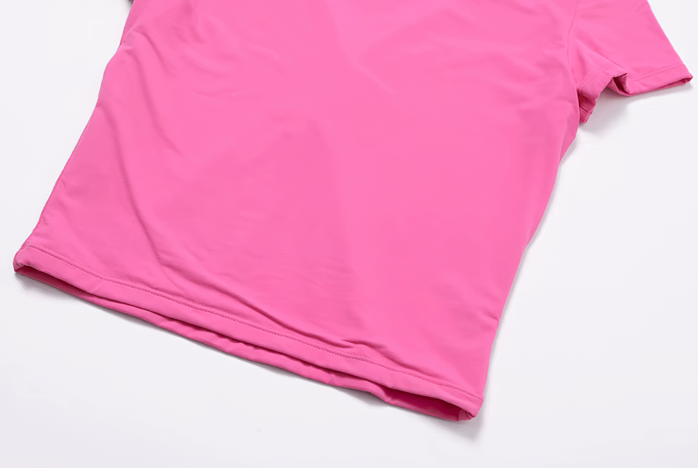Vibrant pink short sleeve t-shirt against a white background, showcasing a sleek and modern casual fashion style.