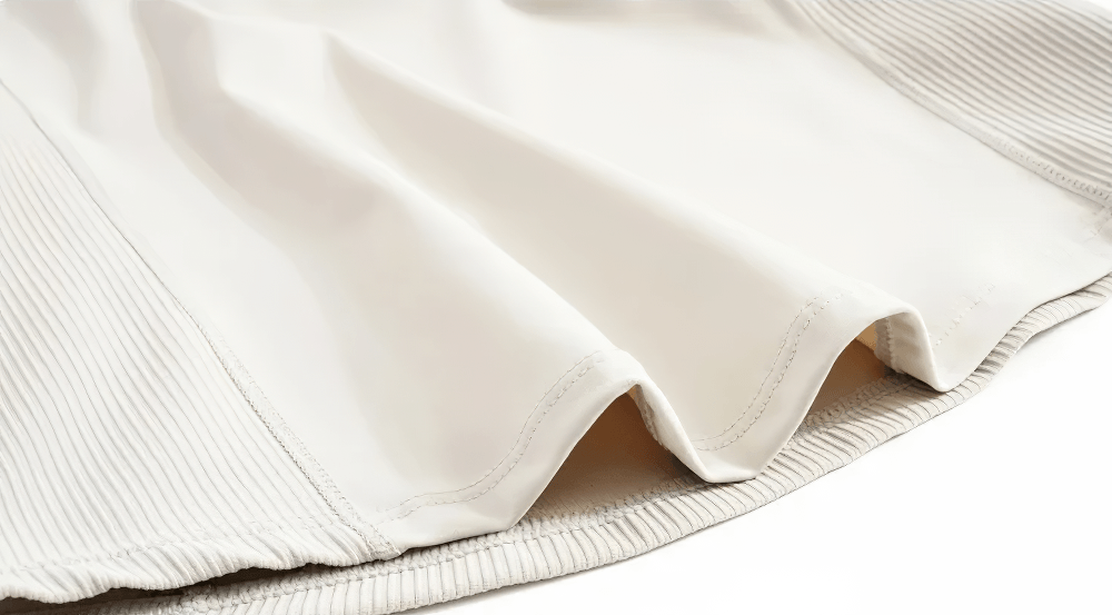 Alt Tag: Female Elastic Quarter Zip Training T-Shirt - SF4453 sage lightweight ribbed hem close-up, nylon elastane stretch workout tee