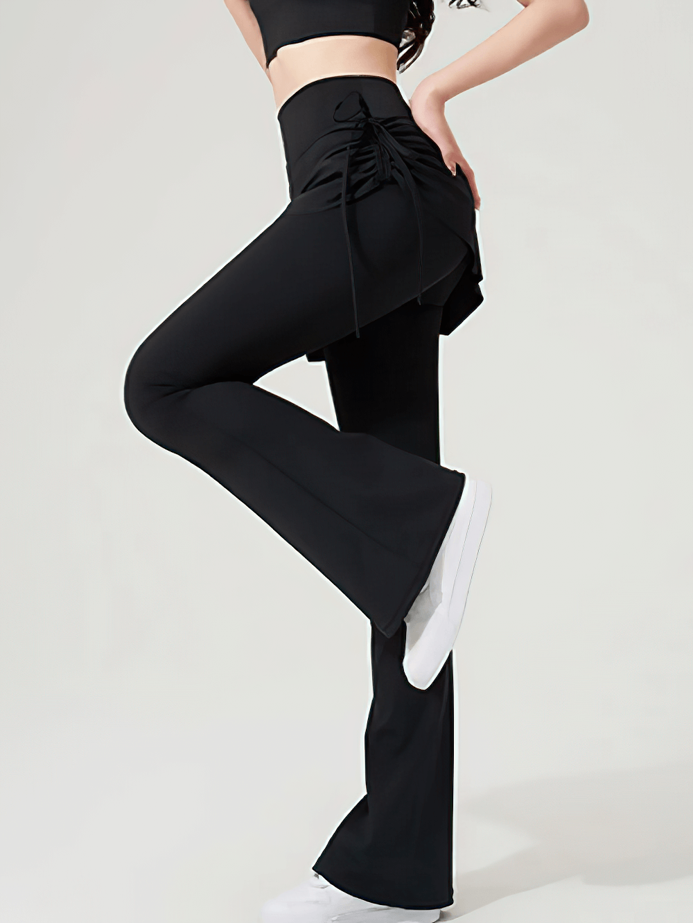 Alt Tag: Female Elastic Skirted Bell Bottom Yoga Leggings - SF4406 black skirted flare yoga leggings with ruched drawstring side, studio-ready fit