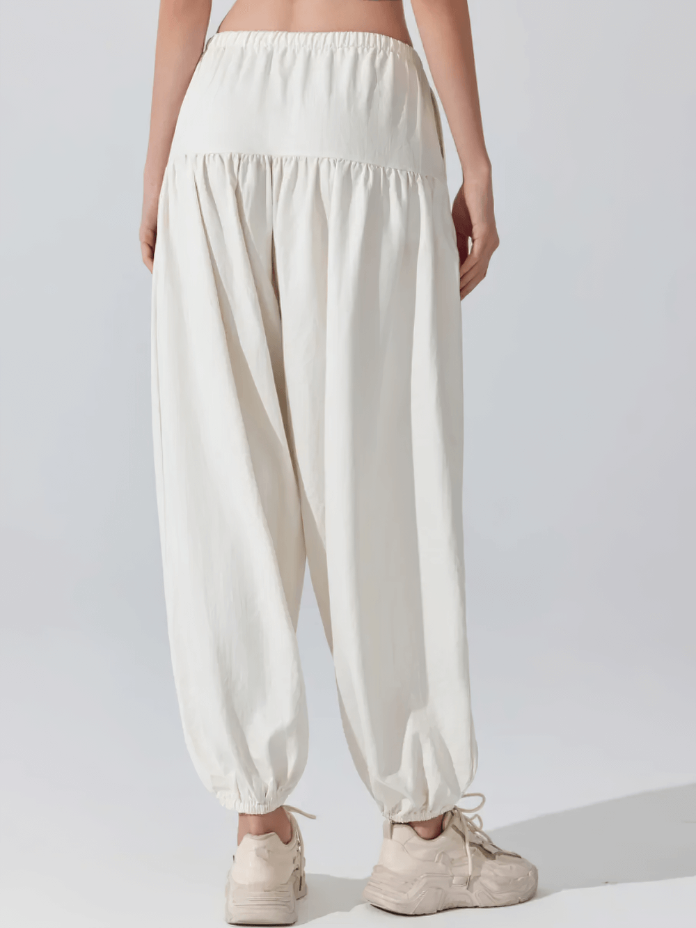 Alt Tag: Female Elastic Waist Harem Jogger Yoga Pants - SF4307 in white, loose full-length harem joggers with elastic waist and cuffed ankles