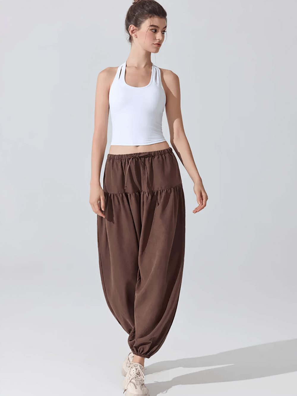 Alt Tag: Female Elastic Waist Harem Jogger Yoga Pants - SF4307 on model, loose full-length harem jogger with elastic waist and gathered cuffs