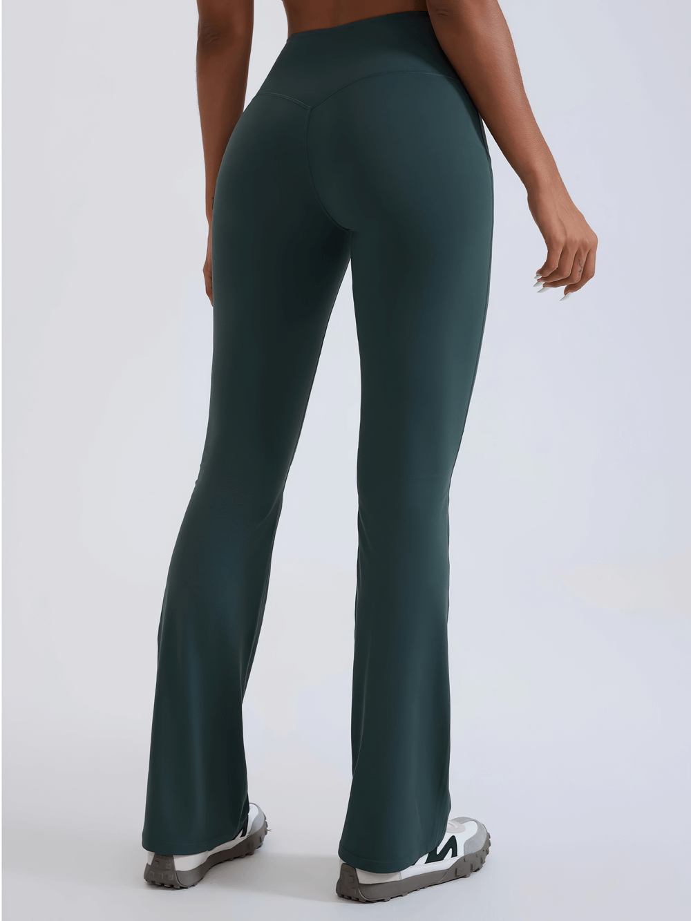 Alt Tag: Female High-Waisted Flared Yoga Pants - SF4286 on model, full-length high-rise flared leggings, stretchy nylon-spandex fit