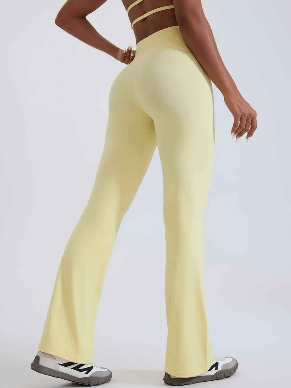 Female High-Waisted Flared Yoga Pants - SF4286 in pastel yellow, full-length flare leggings with elastic high waist for yoga and workouts