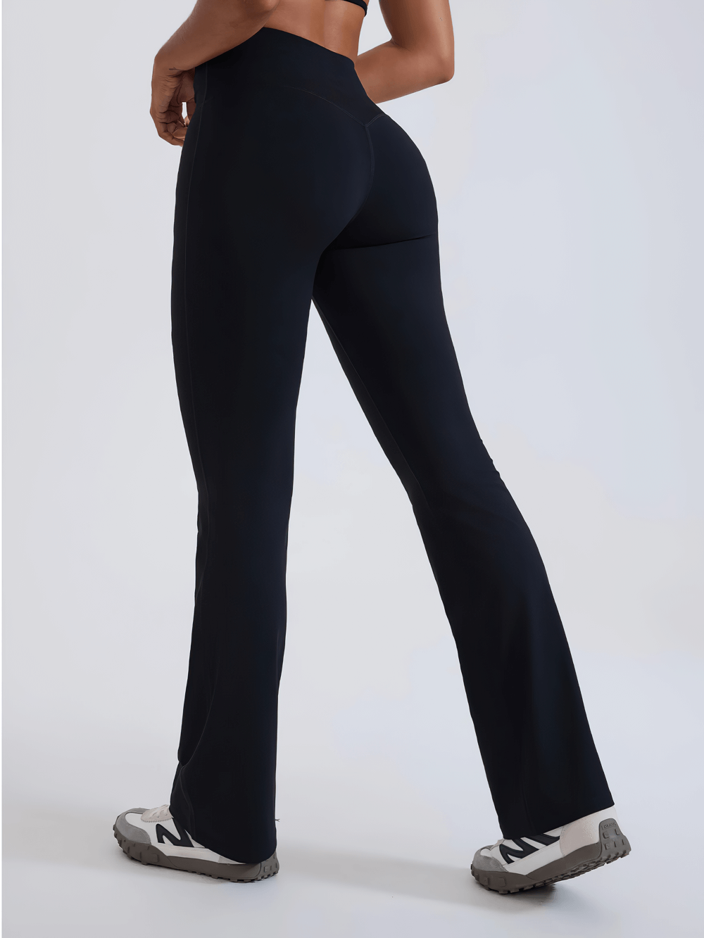 Alt Tag: Female High-Waisted Flared Yoga Pants - SF4286 black full-length flared leggings, high-rise elastic waist, back view
