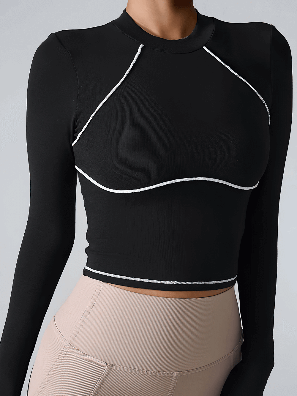 Alt Tag: Female Long Sleeve Compression Yoga Crop Top - SF4385 black quick-dry long sleeve crop top with contrast seams for training