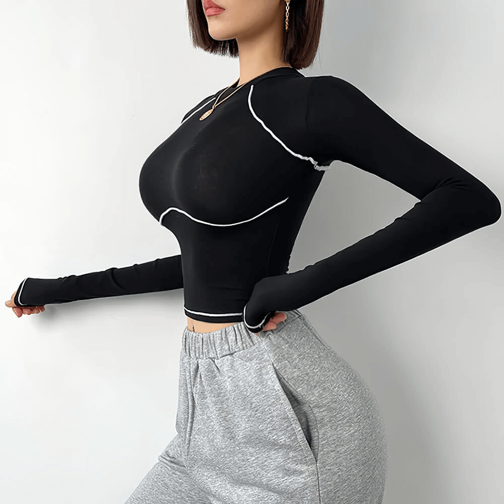 Alt Tag: Female Long Sleeve Compression Yoga Crop Top - SF4385 black quick-dry long sleeve cropped top with white piping for training
