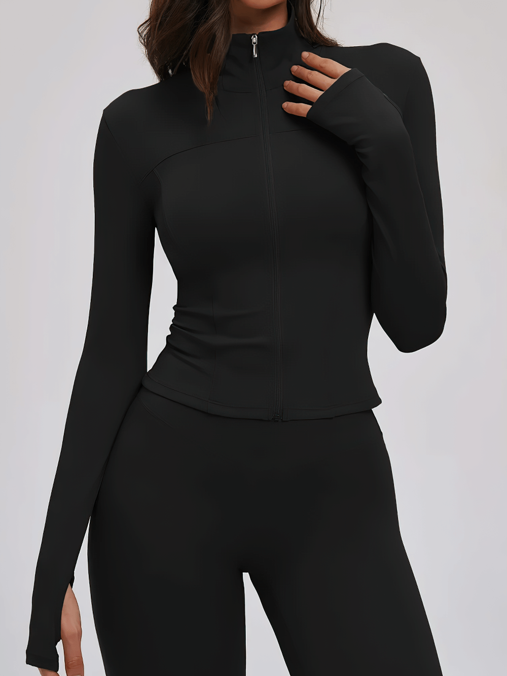 Front view of Female Long Sleeve Jacket for Sports and Fitness - SF4080 in black, showcasing full-length sleeves and zip closure.
