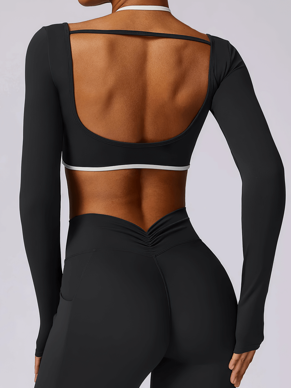 Back view of Female Long Sleeve Yoga Crop Top with White Straps - SF4200, showing stylish and breathable back design.
