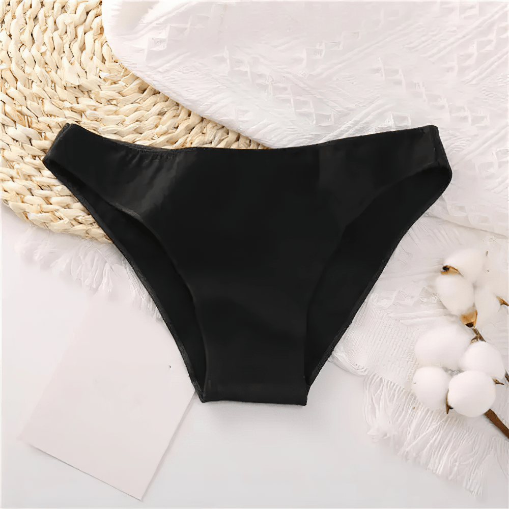 Female Low Waist Cotton Panties with Smooth Edges - SF4667 in classic black color on a textured background.