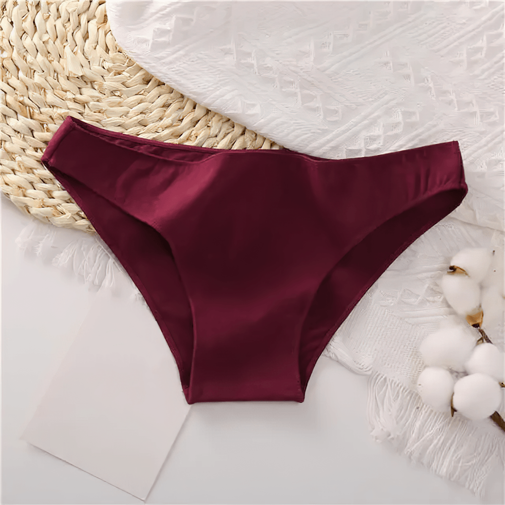 Female Low Waist Cotton Panties with Smooth Edges - SF4667 in burgundy color on a textured background.