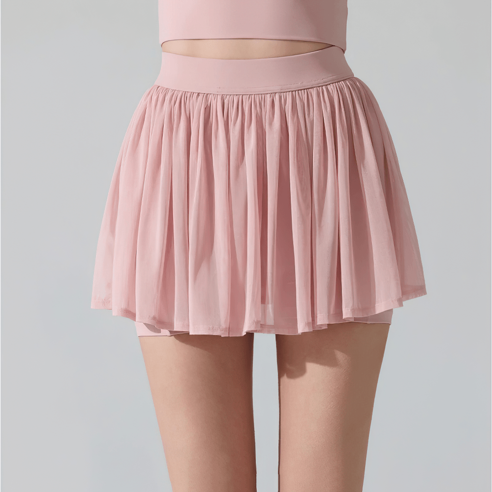 Female Pleated Tennis Skort with Built In Shorts - SF4577 in soft pink, designed for active sports and fitness.