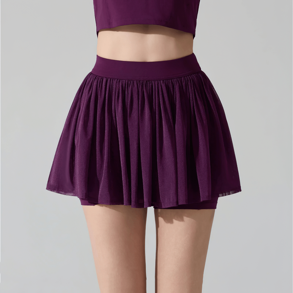 Female Pleated Tennis Skort with Built In Shorts - SF4577 in purple color, showcasing a stylish pleated design with built-in shorts.