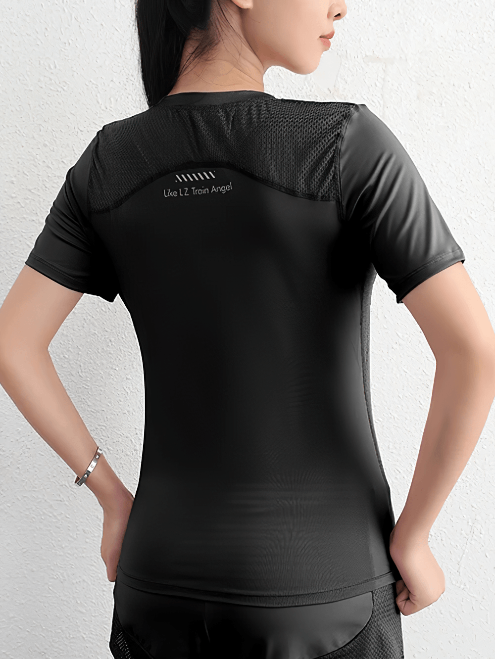 Alt Tag: Female Quick-Dry Mesh Panel Training T-Shirt - SF4458 black women’s short sleeve athletic top with breathable back mesh panel