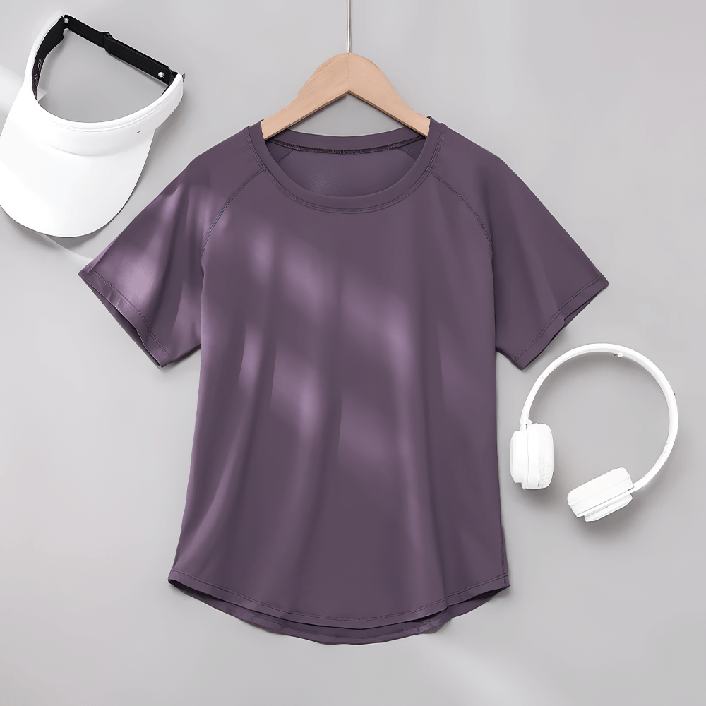 Alt Tag: Female Quick Dry Yoga T-Shirt with Mesh Back Panel - SF4371 purple short-sleeve workout tee on hanger with white visor and headphones