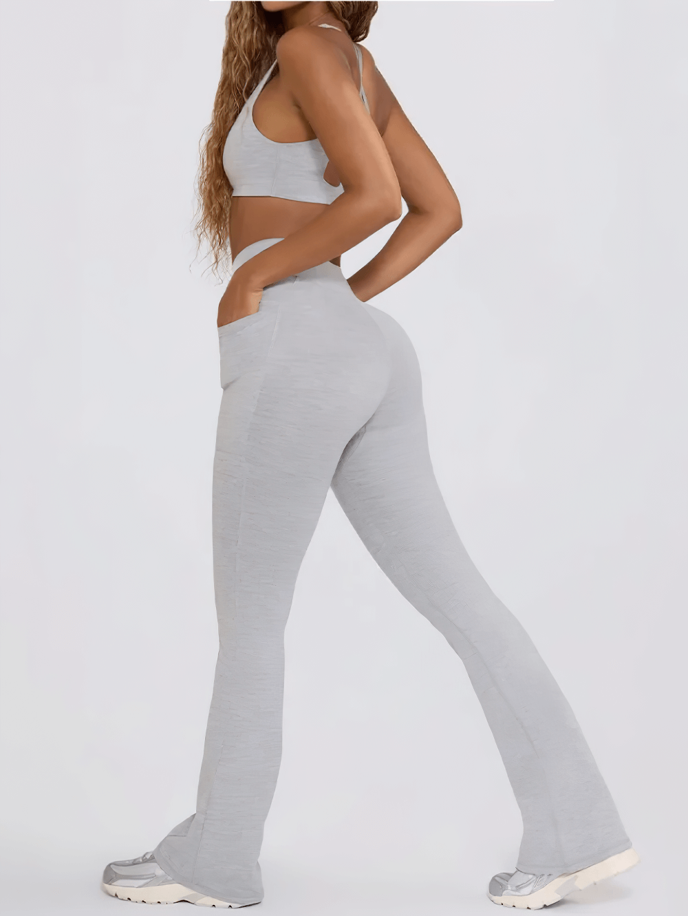 Alt Tag: Female Set of Sports Bra and High Waist Flare Pants - SF4333 light gray racerback bra with V-waist flare pants, gym-ready fit