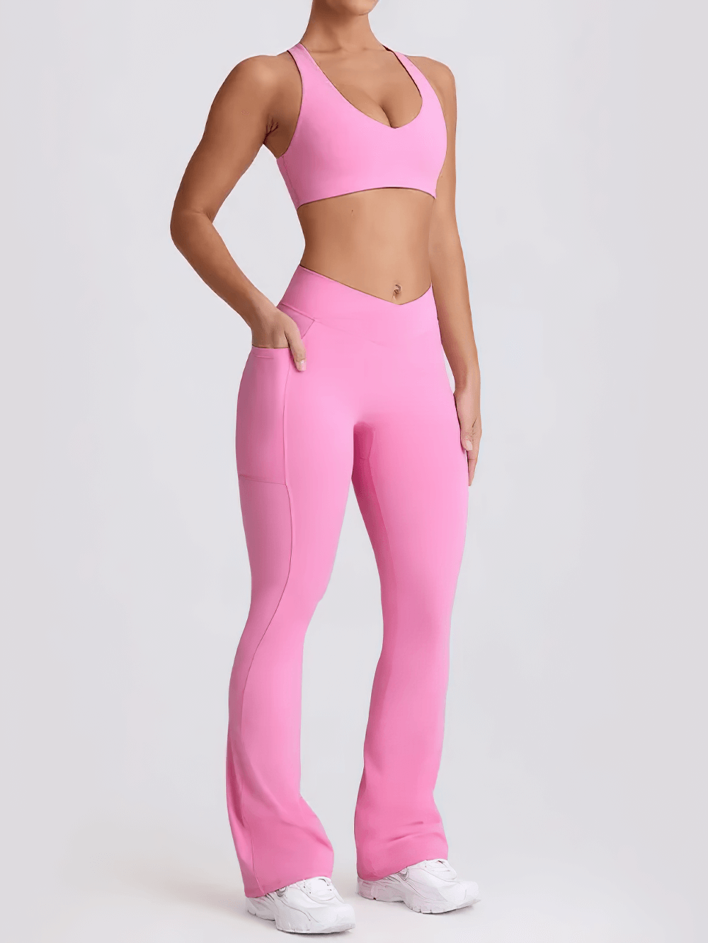 Alt Tag: Female Set of Sports Bra and High Waist Flare Pants - SF4333 pink racerback sports bra and V-waist flare pants yoga set