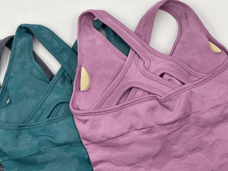 Purple and teal sleeveless seamless jumpsuits for sports, showcasing breathable design and modern style for yoga or workouts, SF1405.