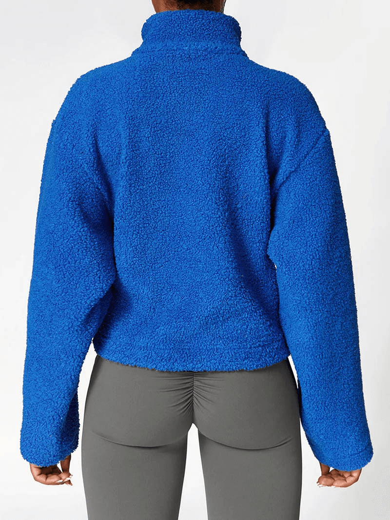 Back view of blue fleece jacket SF1804 for women with thick sleeves, perfect for winter warmth and comfort.