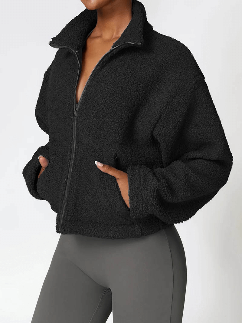 Model wearing SF1804 black fleece jacket with zipper, full sleeves, and cozy warmth, perfect for winter and stylish comfort.