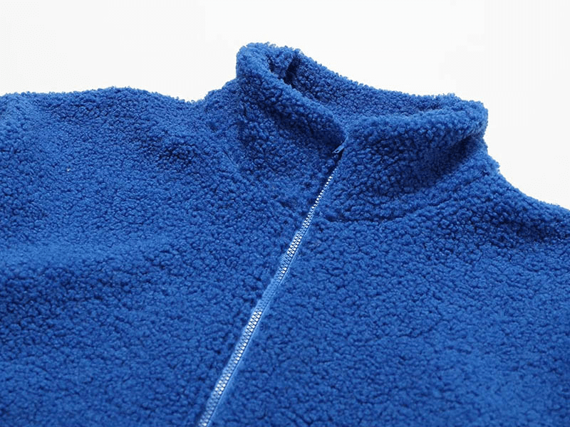 Blue fleece jacket with zipper, thick and warm, perfect for winter. SF1804, breathable polyester, stylish solid pattern.