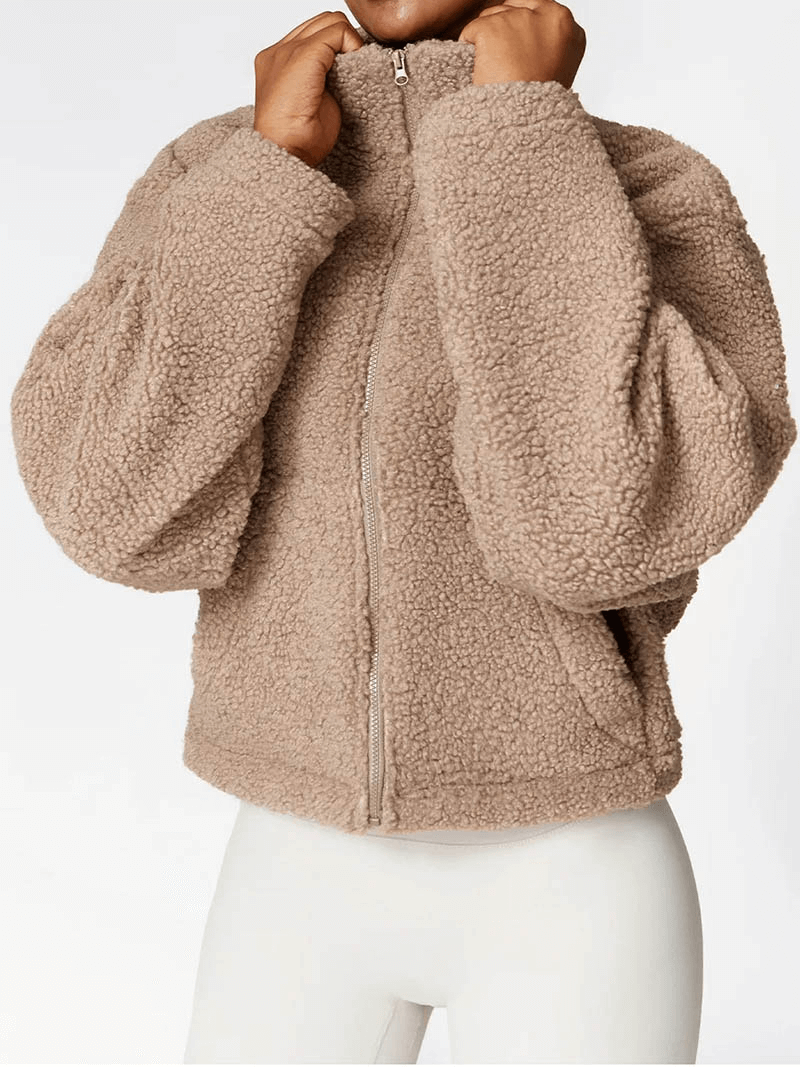 Cozy warm fleece jacket with zipper, perfect for winter. Features thick sleeves and breathable polyester for ultimate comfort. SF1804