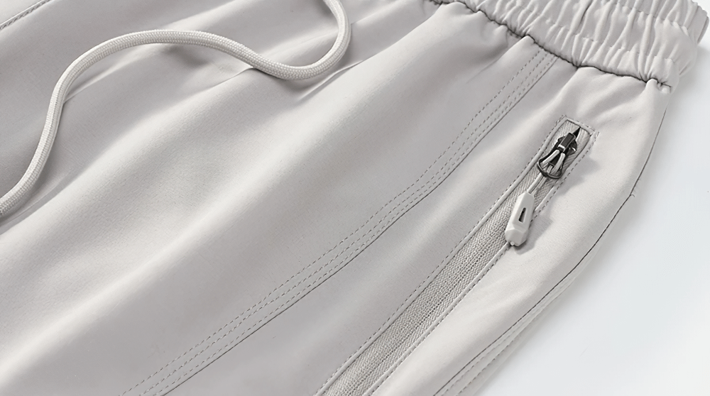 Alt Tag: Female Waterproof Hiking Pants with Zip Pockets - SF4397 close-up of elastic drawstring waist and secure zip pocket detail